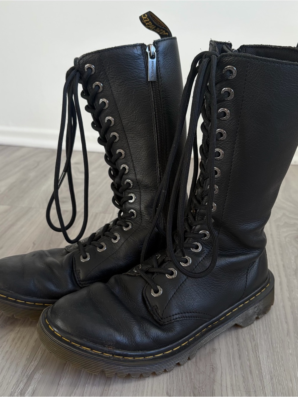 Dr. Martens Black Leather 14-Eye Lace-Up Combat Boots with Yellow Stitching